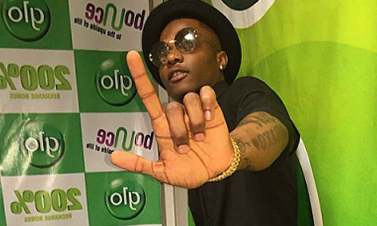 Wizkid Shames Critiques as He Attends OJB’s Candle Light