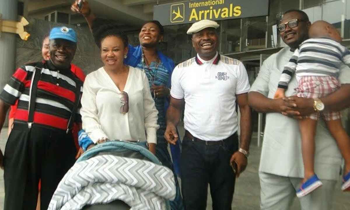 Kenneth Okonkwo arrives in Nigeria with family
