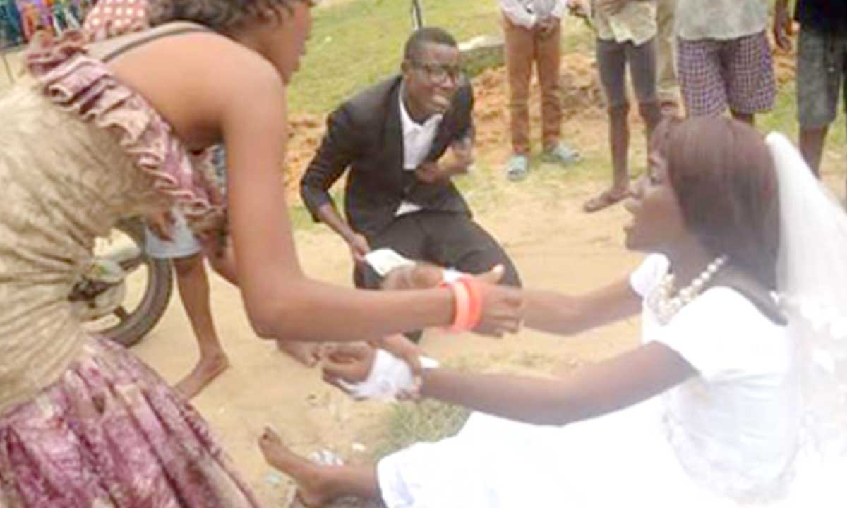 Photos: Wife Abandons Husband During Wedding Reception After Seeing Her True Love in Delta State