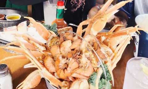 Tayo Sobola Orders for a Big Bowl of Sea Food that will Make Your Mouth Watery