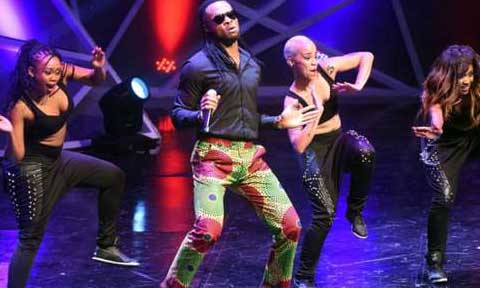 Football Star, Peter Utaka Hooks Up With His Favourite Afro Hip-hop Star, Flavour