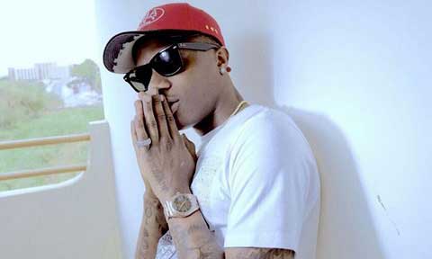 Wizkid Shares Memory Photo of His Father
