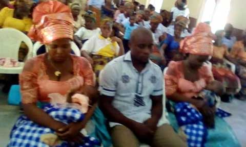 Twin sisters who got pregnant by the same man in Akwa Ibom dedicate children in Church (Photos)