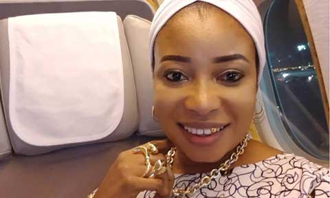 Lizzy Anjorin Flies Back From Mecca To Nigeria In Luxury