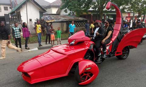 Governor Ayade And His Wife Seen With Red Scorpio Trike Bike In Calabar. Photos