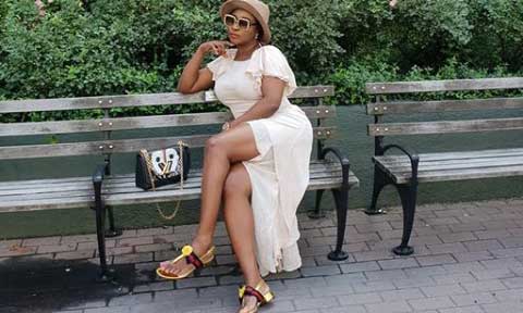 Actress, Ini Edo Shows Off Her Flirty Dress and Gucci Sandals In New York [Photos]