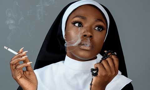 Beverly Osu Defends Controversial Photo Of Her Smoking In A Catholic Nun Outfit