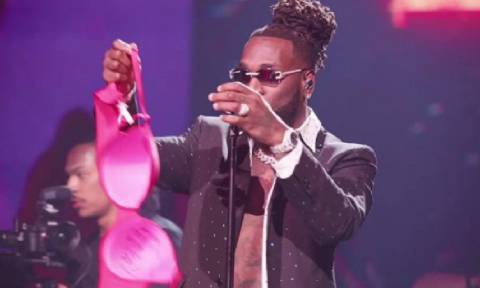 Man Gets Shot By Burna Boy’s Police Escort For Restraining Singer’s Advances To Wife